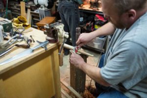 Rob fits the haft to the socket with a spokeshave